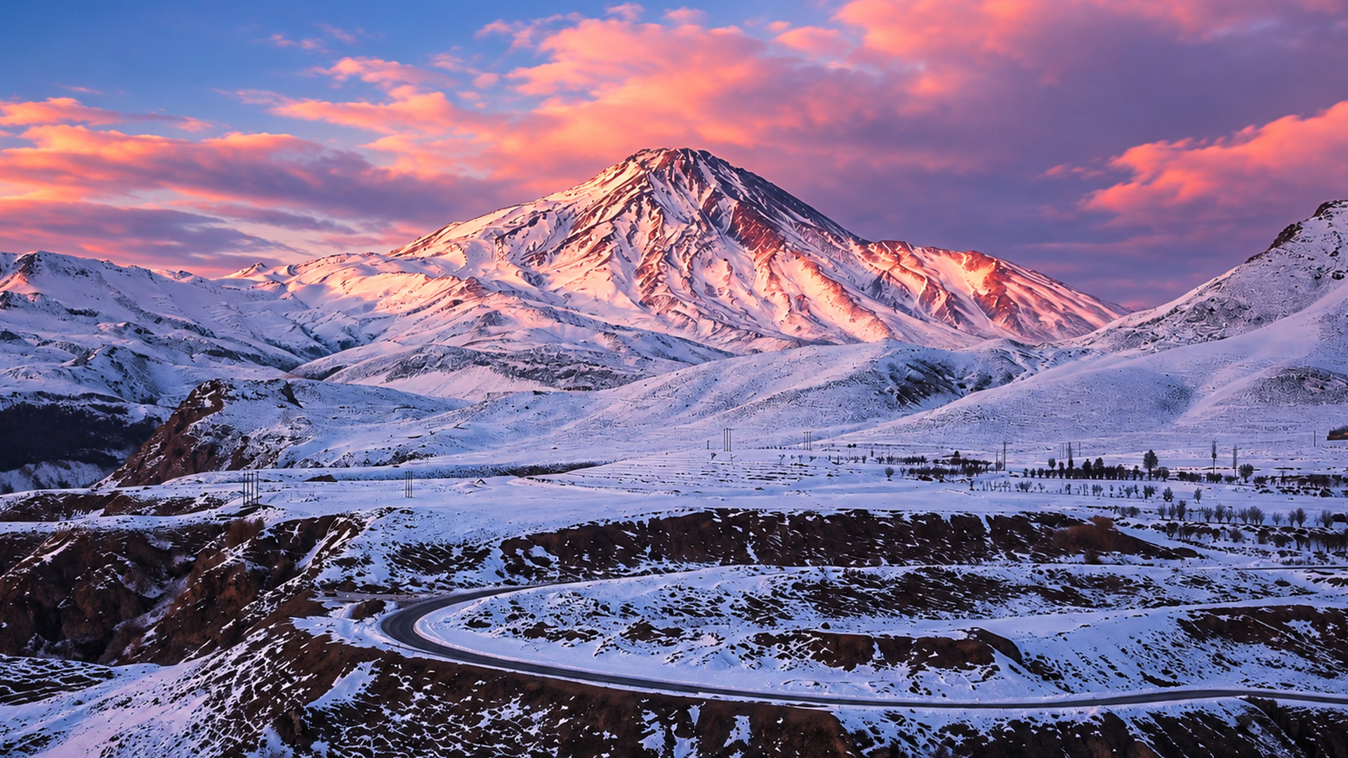 Can you spot the road beneath this volcano?