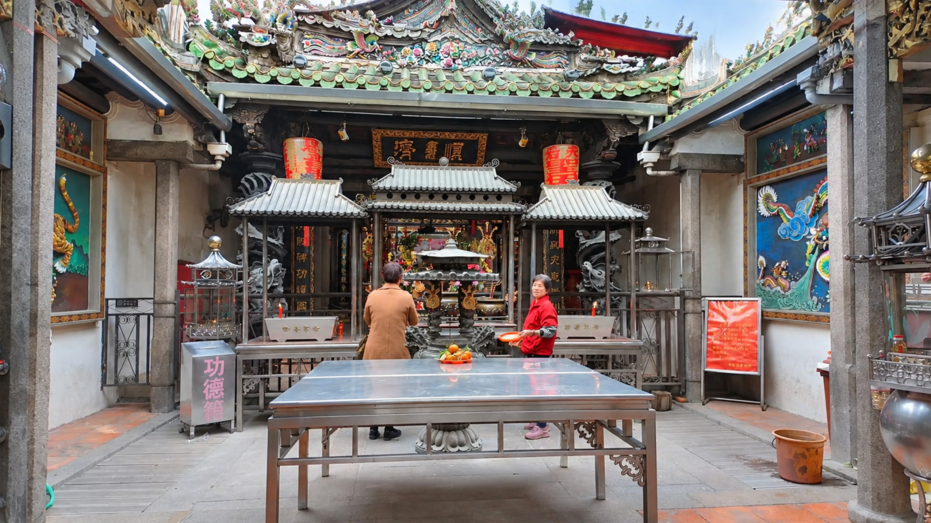 Colorful dragon carvings decorate this traditional Chinese temple in China