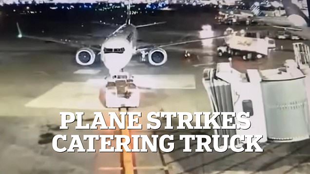 Plane collides with a parked catering truck at Toronto airport