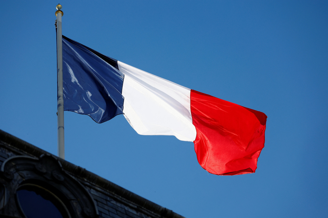 Fitch cuts France’s outlook to negative on weaker growth, widening deficit