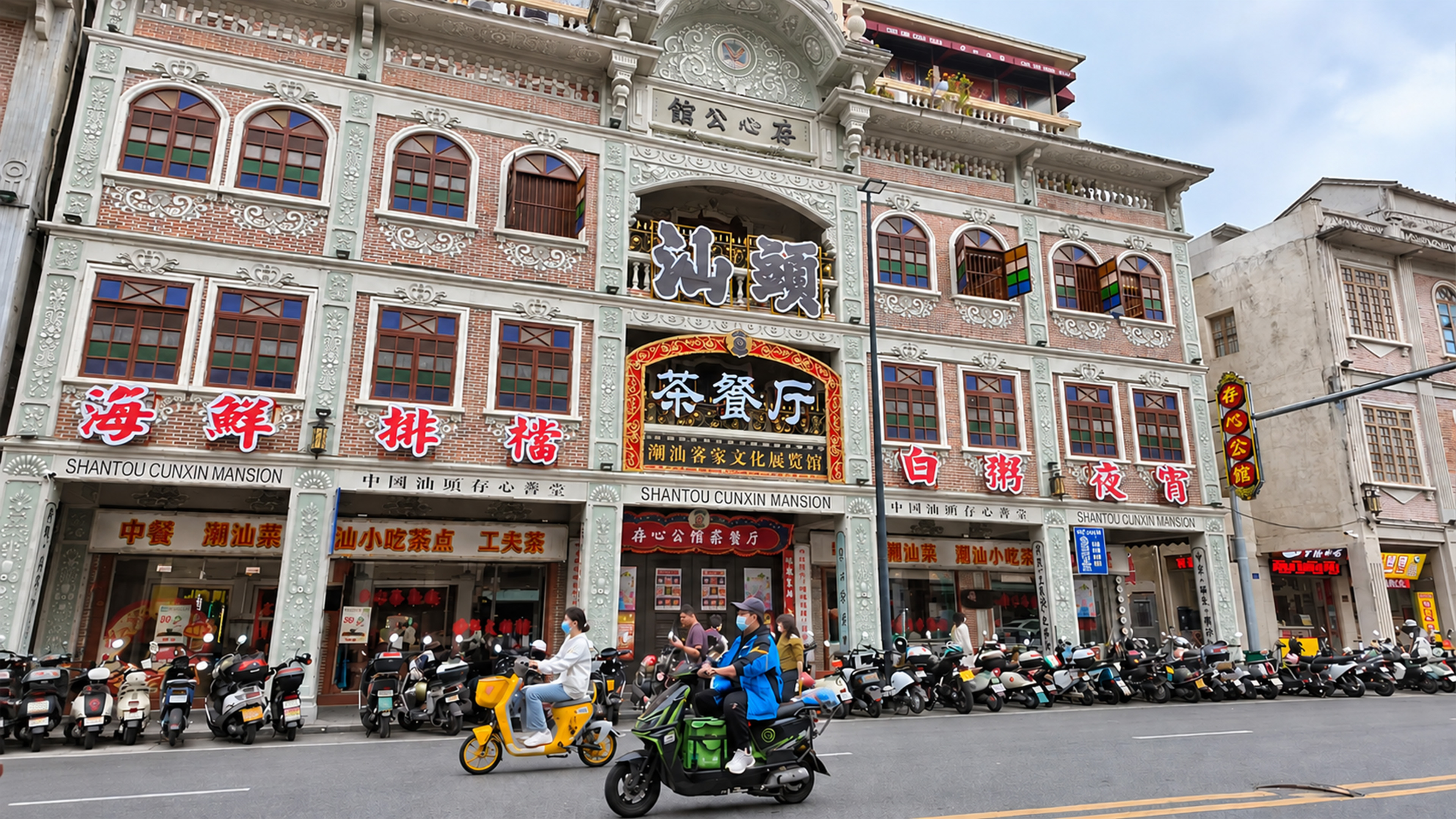 This ornate red brick building in China is filled with restaurants