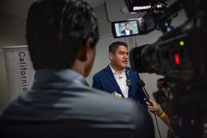 California's 22nd congressional district Democratic candidate Randy Villegas speaks with reporters before a campaign event at a hotel in Bakersfield, California, US, October 22, 2026. Federal immigration agents have fanned out across California's Central Valley in recent weeks, stirring fear in Latino communities and prompting allegations of voter intimidation in a toss-up race that could help determine control of the next US Congress. REUTERS/Carlos Barria