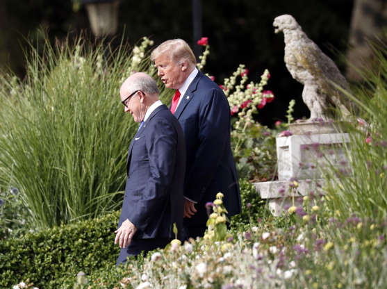 Slide 2 of 29: U.S. President Donald Trump leaves Winfield House, residence of the US Ambassador Woody Johnson, left, before boarding Marine One helicopter for the flight to Chequers, in Buckinghamshire, Friday, July 13, 2018 in London. Trump is in London, where his day will start with a viewing of a military demonstration before he heads to meetings with British Prime Minister Theresa May at Chequers, May's county house. (AP Photo/Pablo Martinez Monsivais)