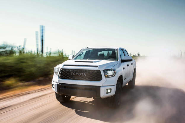 Diapositiva 7 de 12: Starting MSRP: $45,000 (est.) After a year off, Toyota has announced that the fullsize Tundra TRD Pro pickup is back for 2019. Multiple suspension upgrades increase off-road performance while still providing a nimble handling on pavement. Up front, thereâ??s two inches of lift and 1.5 inches of additional wheel travel thanks to TRD-tuned springs. Fox 2.5-inch internal bypass shocks have progressive rate damping, firming up as wheel travel increases to avoid bottoming out. In the rear, leaf springs work with another pair of 2.5-inch Fox shocks for more than two inches of additional wheel travel. New 18-inch BBS wheels are forged from aluminum and save 3.35 pounds of unsprung mass at each corner. Michelin all-terrain tires (P275/65R18) complete the setup. We expect to see the Tundraâ??s tried-and-true 5.7-liter V8 under the hood, boasting 381 horsepower and 401 lb-ft of torque. It will be paired with a throaty TRD Pro exhaust and black chrome exhaust tips Like the smaller Tacoma, the Tundra Pro is protected by a 1/4-inch skid plate up front. It also differentiates itself from other Tundras with a hood scoop, LED headlights, LED accent lights, black trim treatment, and TRD logos emblazoned on the side of the bed. Leather-trimmed seats add a touch of elegance in the cabin, with red stitching accents that match the dash and armrests. And just in case passengers forget, there are TRD logos on the floor mats, seats, shift knob, and center console. And like all new Toyota TRD models, the Tundra comes with standard pedestrian detection with automatic braking, lane departure alert, sway alert, automatic high beams, and dynamic cruise control. Research the Toyota Tundra on MSN Autos | Pricing for the Toyota Tundra in your area