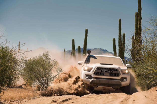 Diapositiva 3 de 12: Starting MSRP: $41,720 The Toyota Tacoma TRD Pro gets some new goodies for 2019, making it more capable, comfortable, and stylish than ever. Under the hood is the 278-horsepower 3.5-liter V6, a Tacoma staple since the third generationâ??s debut in back in 2015. New this year is the available TRD Desert Air Intake, a snorkel that breathes clean air from above the windshield rather than down near the wheel wells where dust, sand, or silt might also be inhaled and clog the intake filter. A six-speed manual transmission is standard, but the automatic option ($2,000 for 2018 models) comes with crawl control, a feature that controls the throttle and brake at low, selectable speeds, allowing the driver to focus on steering and keep the Tacoma chugging along. In certain conditions, crawl control can even get the truck moving again after its been mired in sand or mud. Building on the suspension seen on the Tacoma TRD Off-Road grade, the TRD Pro has Fox 2.5-inch internal-bypass shocks paired with TRD-tuned springs to provide an additional one inch of lift up front. A larger front sway bar keeps steering sharp and improves on-road handling. Out back, a pair of 2.5-inch shocks wear 2-inch piggyback reservoirs and are paired with progressive-rate off-road leaf springs. TRD Pro-specific wheels give the Tacoma a one-inch wider track both front and rear. Beefy Goodyear all-terrain Wrangler Kevlar tires (P265/70R16) are at home both on pavement and in the dirt. The TRD Pro also comes with premium JBL audio with subwoofer, navigation, wireless charging, leather seats, power sliding rear window glass, and dual-zone climate control. Built in Texas, the 2019 Tacoma TRD Pro will be available this fall in three colors: Super White, Midnight Black Metallic or Voodoo Blue. Research the Toyota Tacoma on MSN Autos | Pricing for the Toyota Tacoma in your area