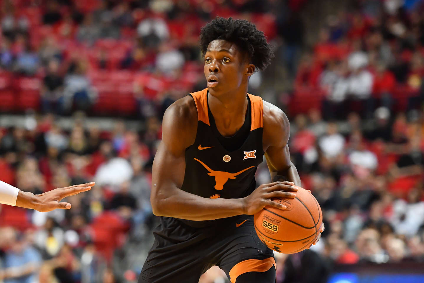 CAPTION: LUBBOCK, TX - MARCH 1: Andrew Jones #1 of the Texas Longhorns handles the ball during the game against the Texas Tech Red Raiders on March 1, 2017 at United Supermarkets Arena in Lubbock, Texas. Texas Tech defeated Texas 67-57.