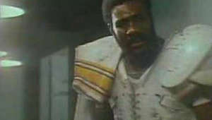 a close up of a person: One of the famous Coca-Cola commercial in history featuring 'Mean' Joe Greene in 1979.