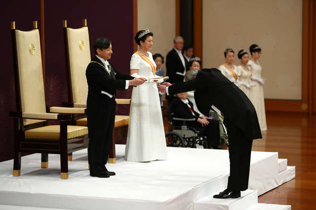 Slide 2 of 27: Japan's Emperor Naruhito and Empress Masako attend a ceremony called Sokui-go-Choken-no-gi, his first audience after the accession to the throne, at the Imperial Palace in Tokyo, May 1, 2019.