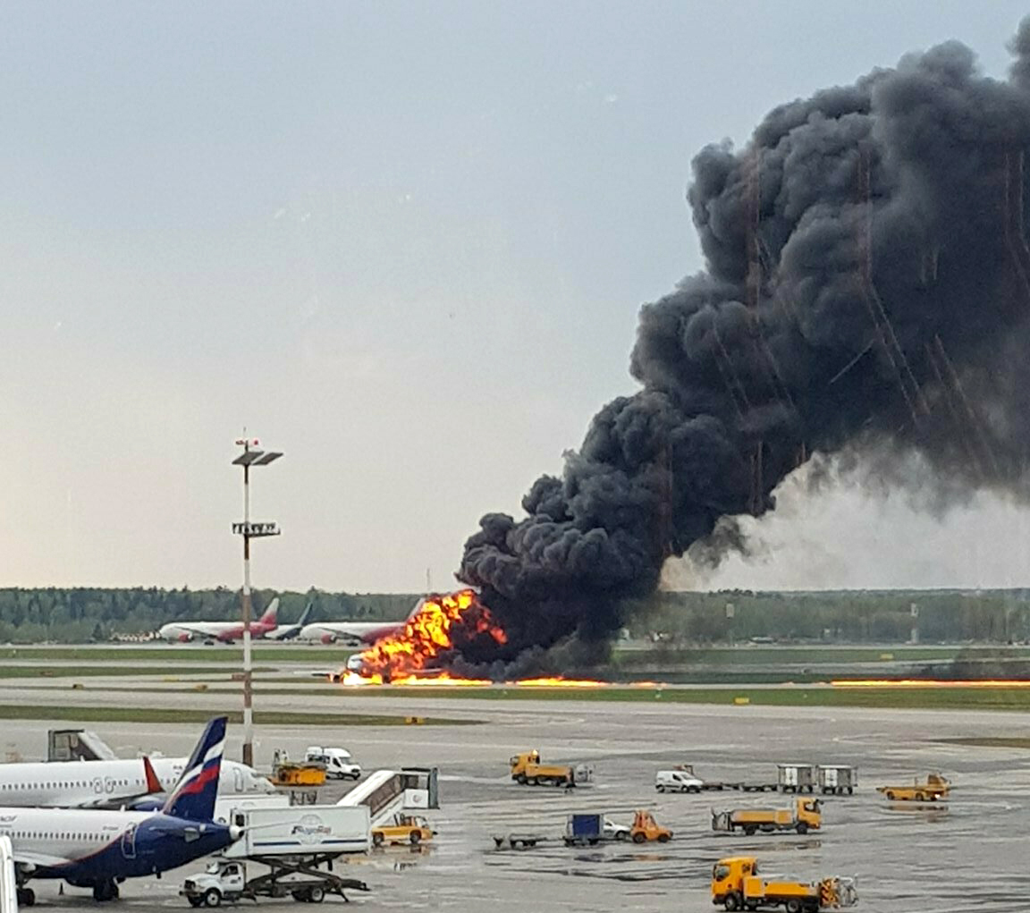 In this image provided by Riccardo Dalla Francesca shows smoke rises from a fire on a plane at Moscow's Sheremetyevo airport on Sunday, May 5, 2019.