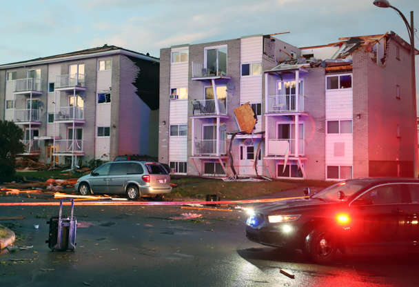 Apartment buildings are shown after a tornado torn roofs off and windows blown out after a tornado c... - THE CANADIAN PRESS/Sean Kilpatrick Slide 5 of 21: Apartment buildings are shown after a tornado torn roofs off and windows blown out after a tornado caused extensive damage to a Gatineau, Que. neighbourhood forcing hundreds of families to evacuate their homes on Sept. 21, 2018. A tornado damaged cars in Gatineau, Que., and houses in a community west of Ottawa on Friday afternoon as much of southern Ontario saw severe thunderstorms and high wind gusts, Environment Canada said.