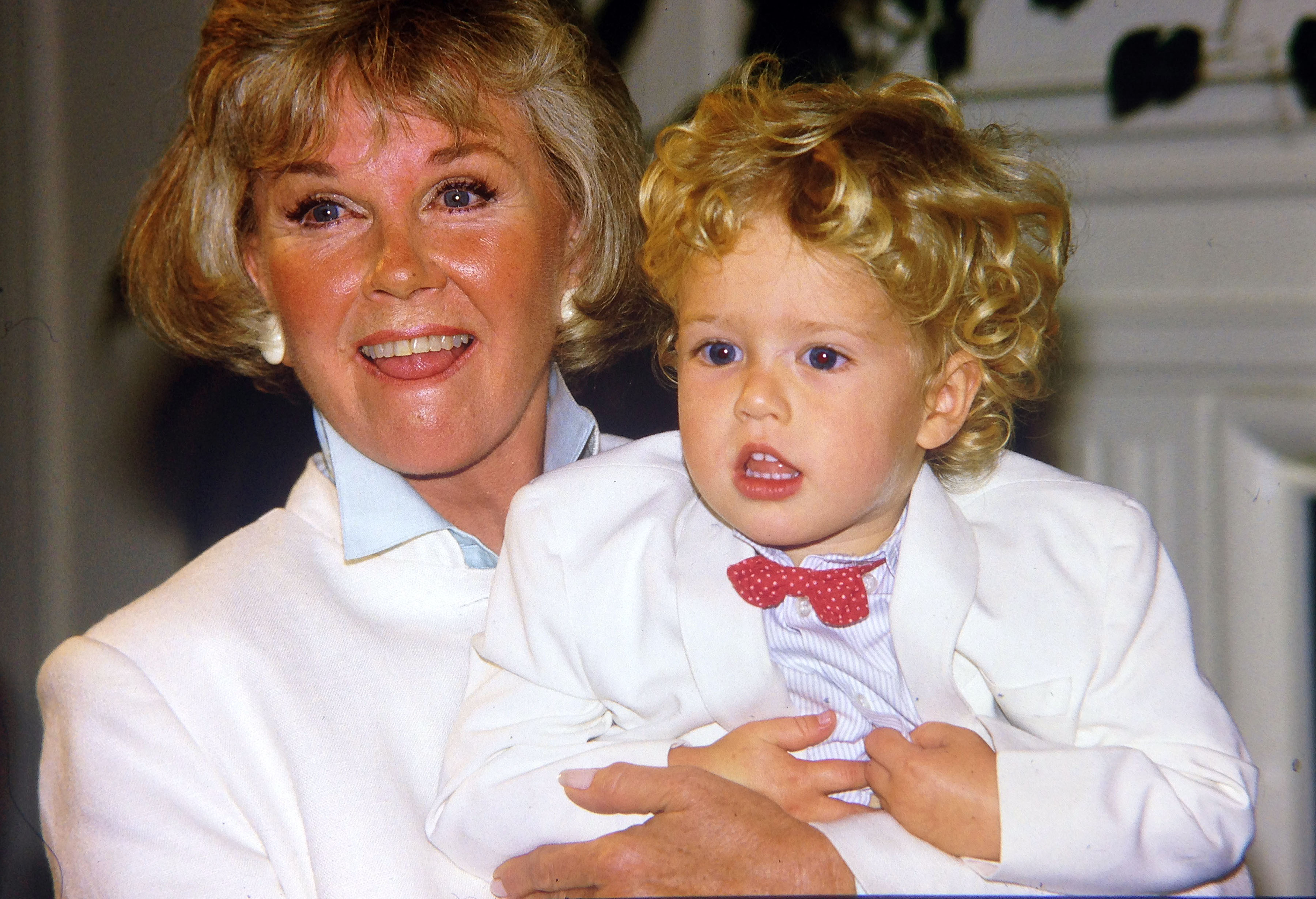 CARMEL CA, - JULY 16:  Doris Day  with her grandson Ryan Melcher 4, the son of her only child Terry Melcher at a press conference at the hotel she owns in Carmel, California July 16, 1985 ( Photo by Paul Harris/Getty Images )