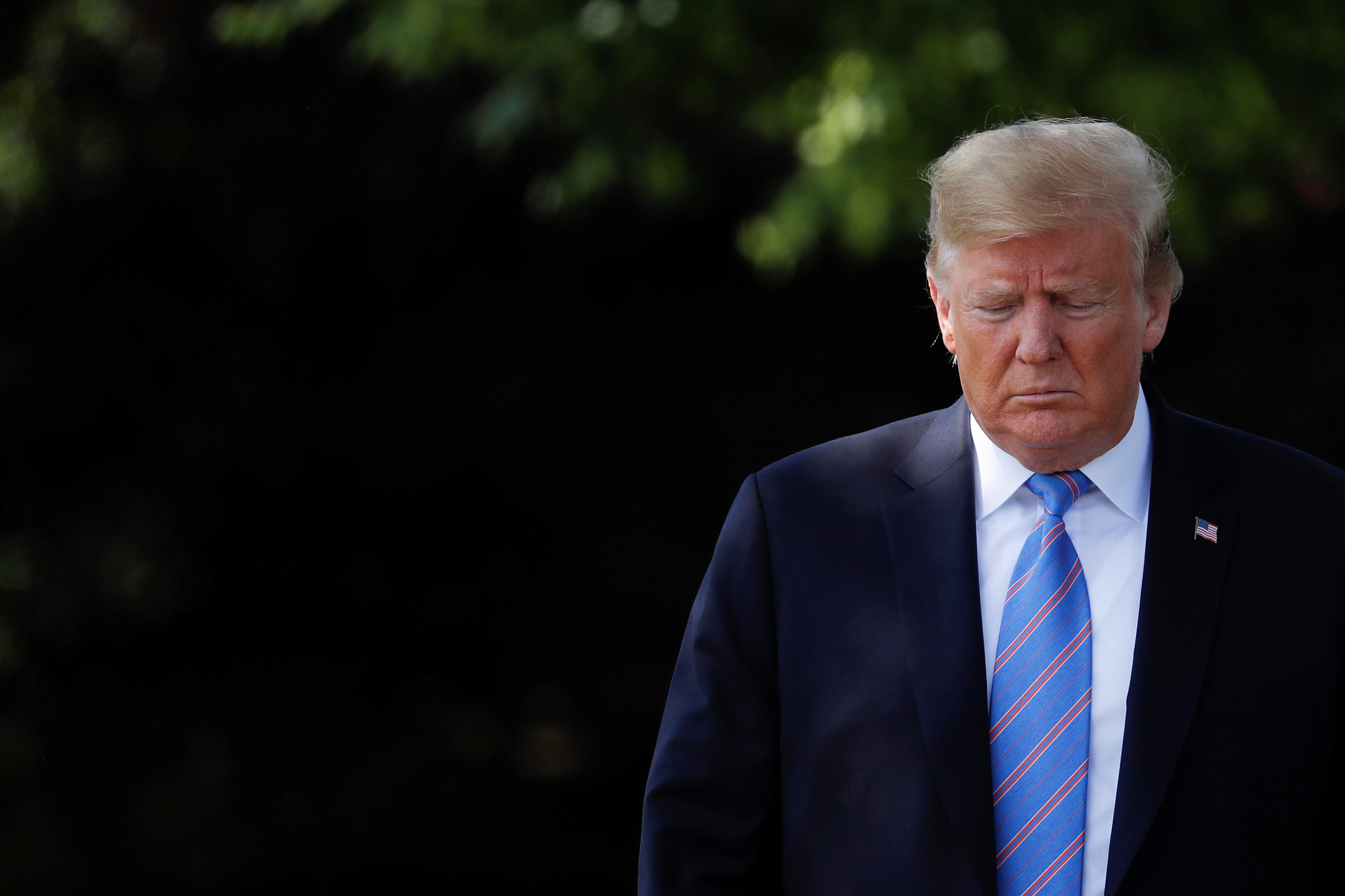 U.S. President Donald Trump walks towards reporters to talk as he departs for travel to Louisiana from the White House in Washington, U.S., May 14, 2019. REUTERS/Carlos Barria