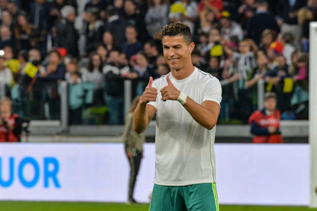 File Phoot-Cristiano Ronaldo from 'Campioni Per La Ricerca' seen making a gesture during the 'Partita Del Cuore' Charity Match at Allianz Stadium. Campioni Per La Ricerca win the "Champions for Research" 3-2 against the "Italian National Singers".