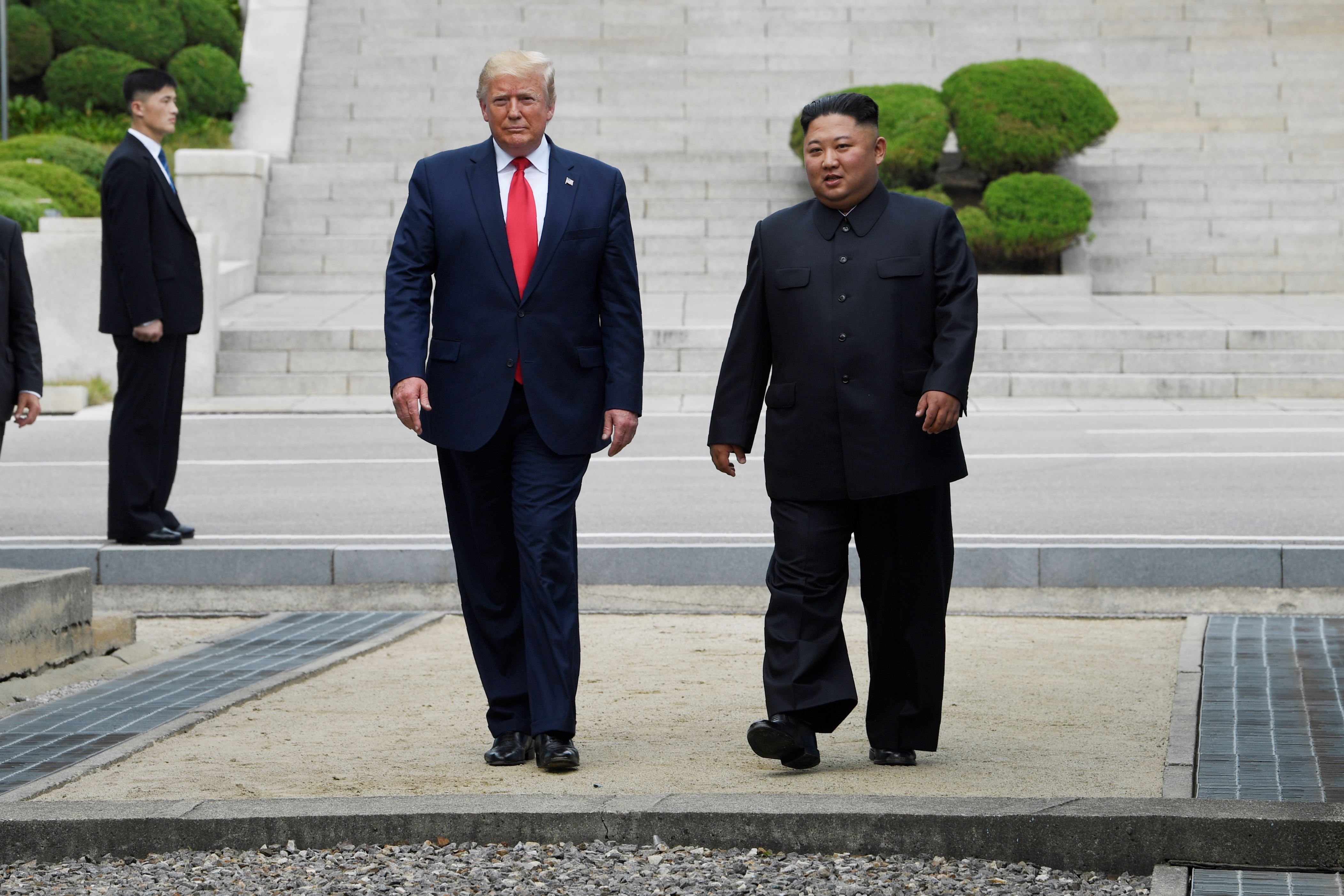 President Donald Trump and North Korean leader Kim Jong Un, stand on the North Korean side of the border in the Demilitarized Zone, Sunday, June 30, 2019 in North Korea. (AP Photo/Susan Walsh)