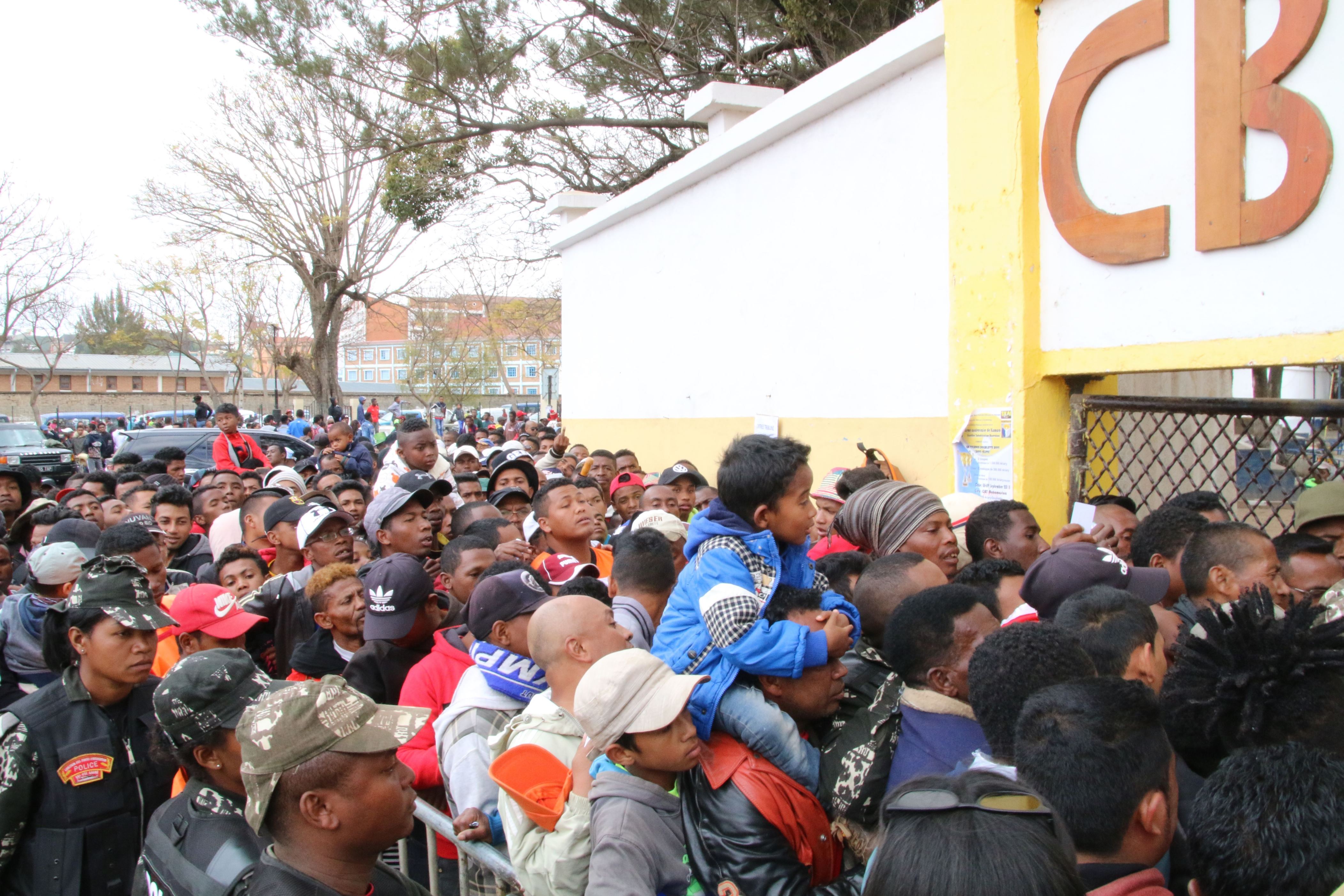 Malagasy people queue outside a football stadium waiting to enter and attend the African Cup of Nations qualifier match between Senegal and Madagascar on September 9, 2018 in Antananarivo, Madagascar. - At least one person was killed and nearly 40 were injured in a stampede ahead of an Africa Cup of Nations qualifier Sunday in which Madagascar hit back twice to draw 2-2 with Senegal. (Photo by Mamyrael / AFP)        (Photo credit should read MAMYRAEL/AFP/Getty Images)
