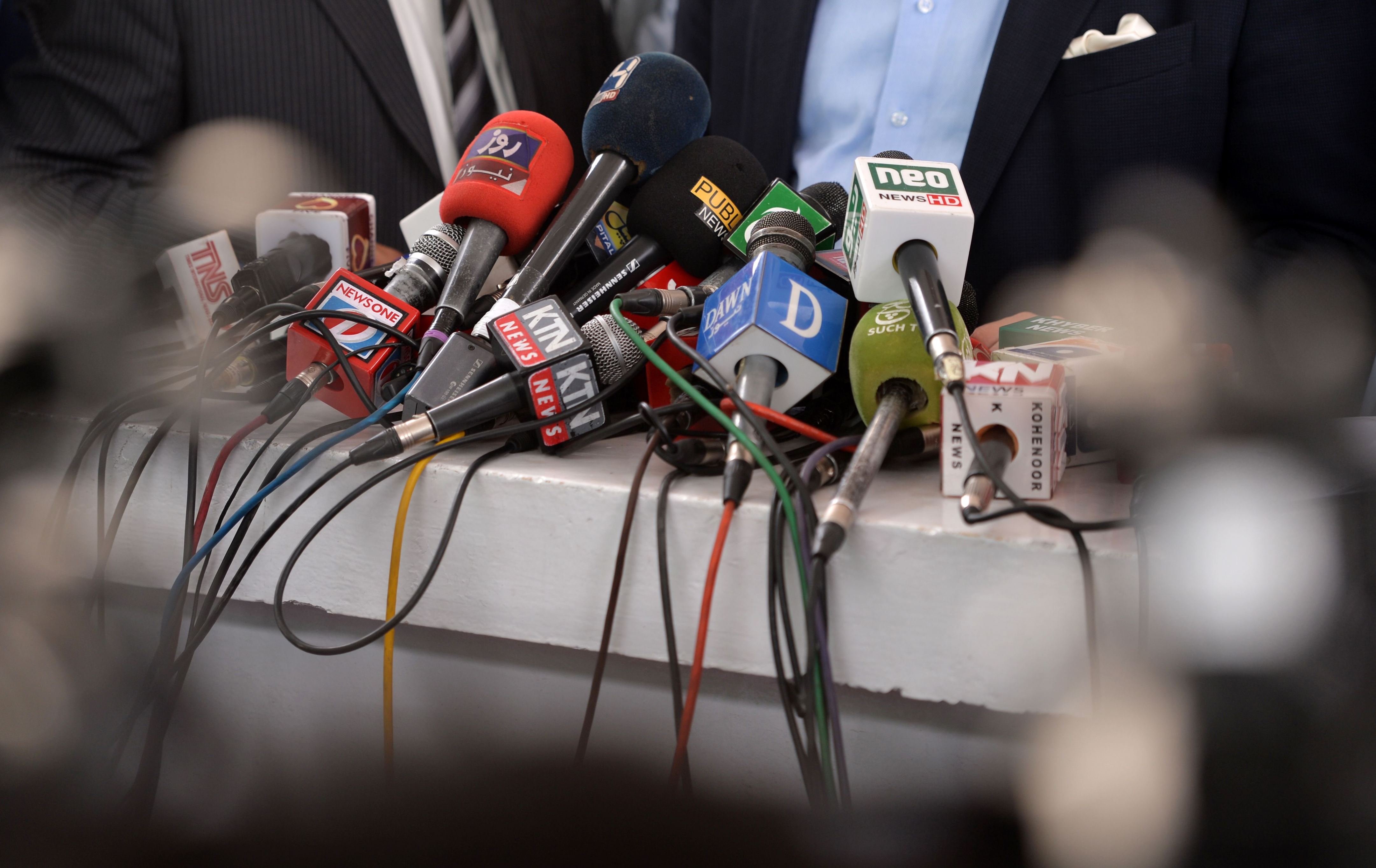 Microphones of the different Pakistani news channels