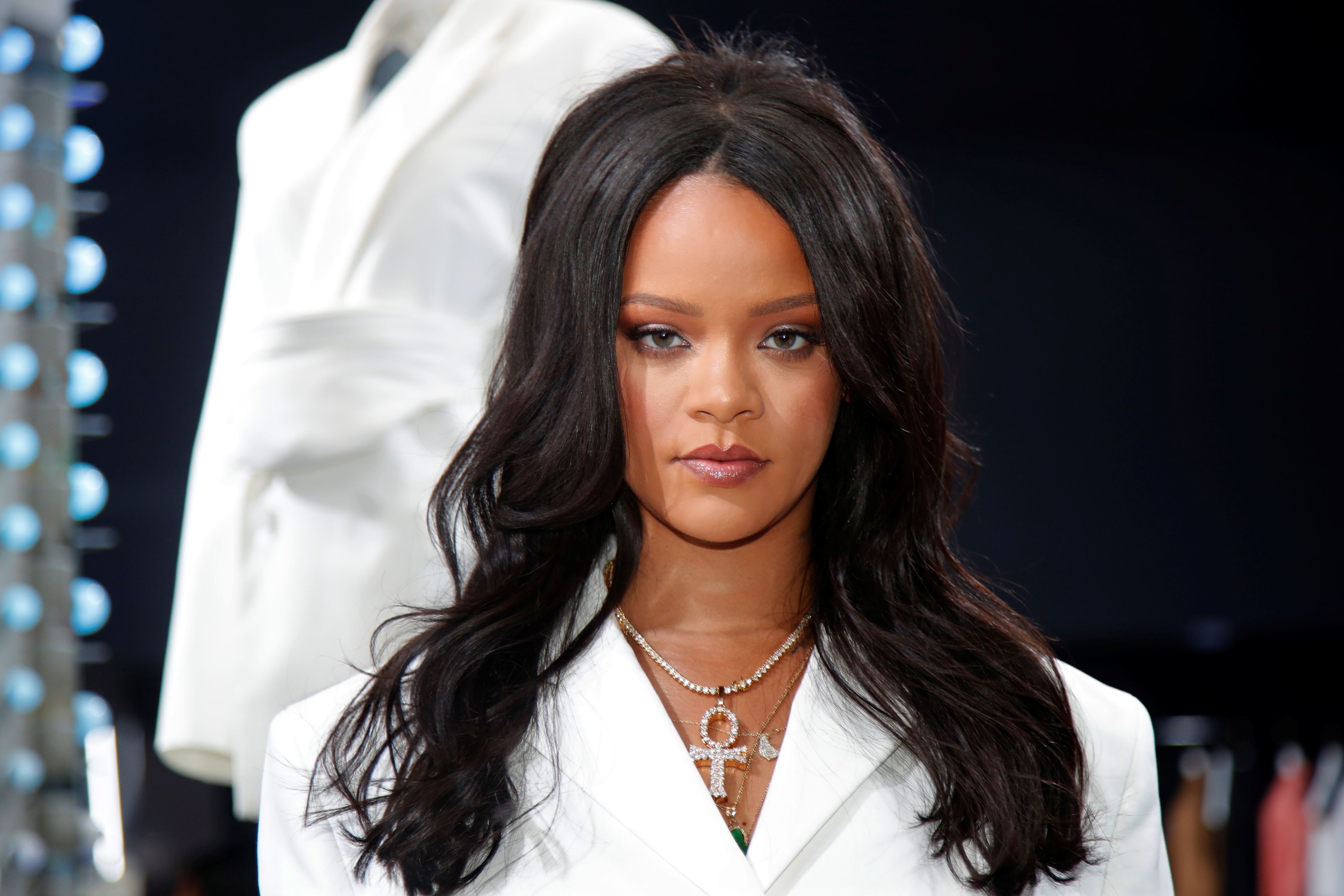 Pop superstar Rihanna poses in a pop-up store to present her first collection with LVMH for the new label, Fenty, which includes ready-to-wear and accessories, such as shoes, sunglasses and jewellery, Paris, France May 22, 2019. Picture taken May 22, 2019.   REUTERS/Charles Platiau
