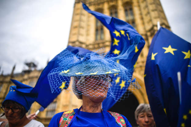 Slide 1 of 54: LONDON, ENGLAND - AUGUST 28: Pro-EU supporters protest outside the Houses of Parliament on August 28, 2019 in London, England. British Prime Minister Boris Johnson has written to Cabinet colleagues telling them that his government has requested the Queen suspend parliament for longer than the usual conference season. Parliament will return for a new session with a Queen's Speech on 14 October 2019. Some Remain supporting MPs believe this move to be a ploy to hinder legislation preventing a No Deal Brexit. (Photo by Peter Summers/Getty Images)