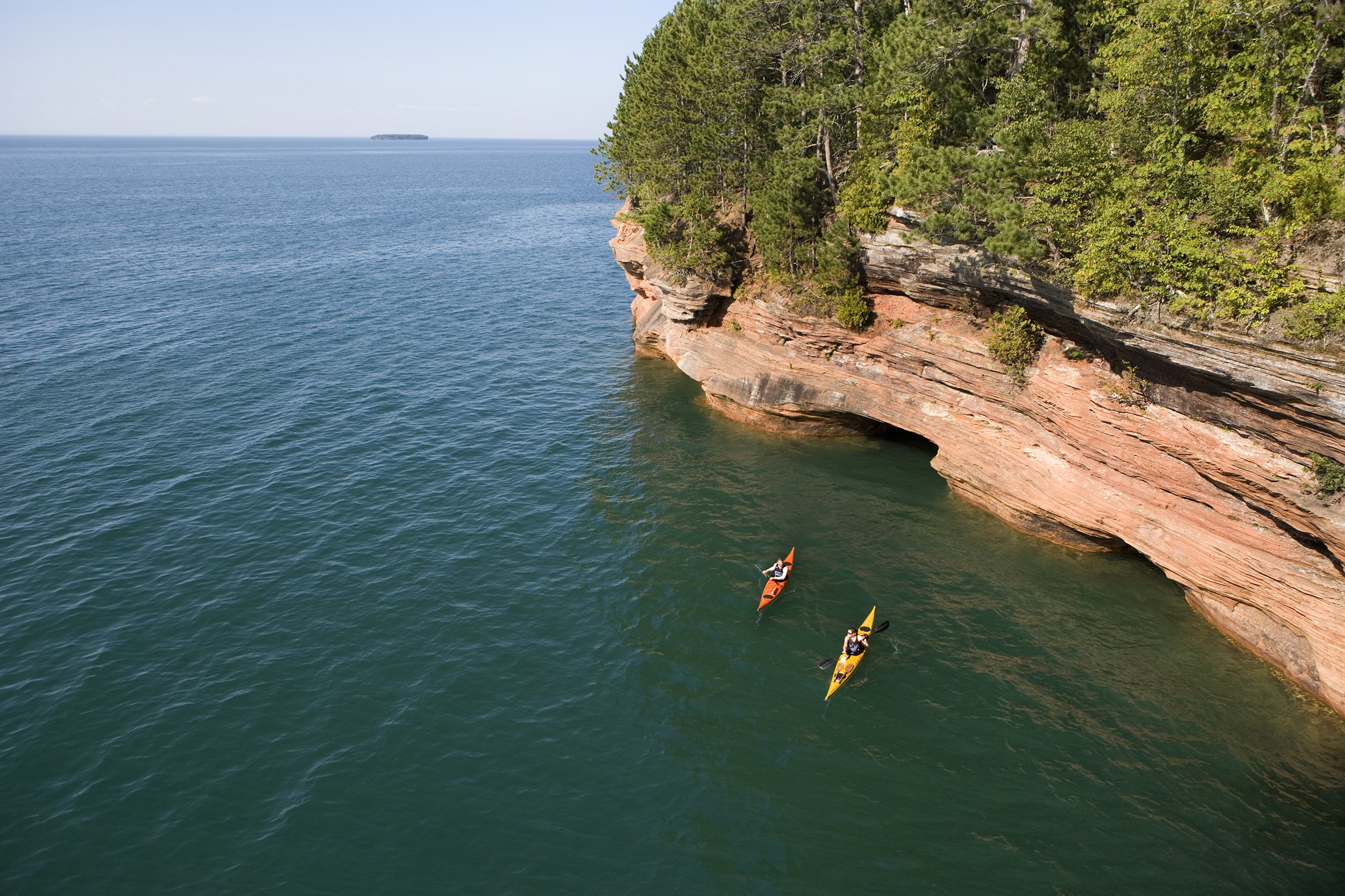 <p>Wisconsin's <a href="https://www.nps.gov/apis/index.htm">Apostle Islands National Lakeshore</a> encompasses 12 miles of mainland along Lake Superior, but many visitors enjoy heading to the reserve's 21 islands to hike and camp on windswept beaches and view historic lighthouses. To get there, take a boat or kayak or hop aboard the 140-passenger National Park Service cruiser. A $10 reservation fee is charged for camping, and individual campsite rental is $15 a night.</p>