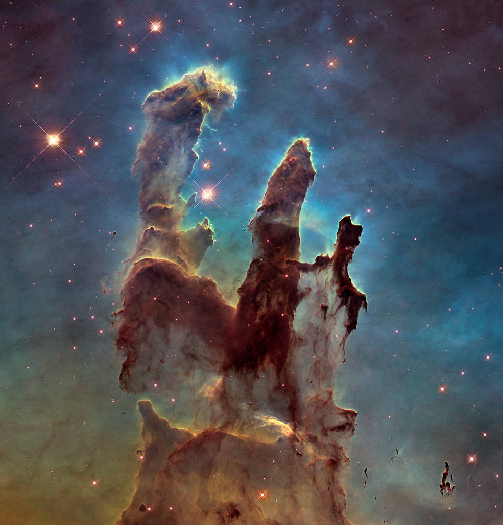 Διαφάνεια 10 από 10: 1st April 1995: An image taken via Hubble telescope entitled Pillars of Creation, depicting gaseous pillars in M16, the Eagle Nebula. These columns of hydrogen and dust act as incubators for new stars. (Photo by Space Frontiers/Hulton Archive/Getty Images)