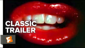 The Rocky Horror Picture Show (1975) Trailer #1: Check out the trailer starring Tim Curry, Susan Sarandon, and Barry Bostwick! Be the first to watch, comment, and share old trailers dropping @MovieclipsClassicTrailers.

► Buy or Rent on FandangoNOW: https://www.fandangonow.com/details/movie/the-rocky-horror-picture-show-1975/1MV484124d402f74b8487ead563caaf5835?ele=searchresult&elc=rocky%20horror&eli=1&eci=movies?cmp=MCYT_YouTube_Desc 

Watch more Classic Trailers:
► Classic Horror Films Playlist http://bit.ly/2ovE2sV
► Classic Romantic Comedies Playlist http://bit.ly/2o3paBu 
► Classic Time-Travel Films Playlist http://bit.ly/2o3LzhZ 

In this cult classic, sweethearts Brad (Barry Bostwick) and Janet (Susan Sarandon), stuck with a flat tire during a storm, discover the eerie mansion of Dr. Frank-N-Furter (Tim Curry), a transvestite scientist. As their innocence is lost, Brad and Janet meet a houseful of wild characters, including a rocking biker (Meat Loaf) and a creepy butler (Richard O'Brien). Through elaborate dances and rock songs, Frank-N-Furter unveils his latest creation: a muscular man named "Rocky."

Subscribe to CLASSIC TRAILERS: http://bit.ly/1u43jDe
We're on SNAPCHAT: http://bit.ly/2cOzfcy
Like us on FACEBOOK: http://bit.ly/1QyRMsE
Follow us on TWITTER: http://bit.ly/1ghOWmt

Welcome to the Fandango MOVIECLIPS Trailer Vault Channel. Where trailers from the past, from recent to long ago, from a time before YouTube, can be enjoyed by all. We search near and far for original movie trailer from all decades. Feel free to send us your trailer requests and we will do our best to hunt it down.