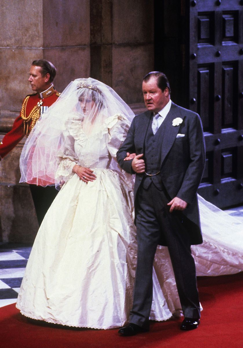 <p>Diana and her father make their way to the altar. Can you imagine how wild their nerves must have been at this moment??? P.S. Take a closer at the Spencer Tiara—yep, she wore her own family jewels for her big day.</p>