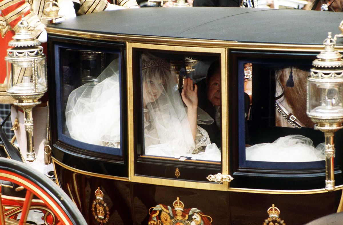 <p>There are few moments more anticipated by the public than this one. Princess Diana arrived at St. Paul's Cathedral and everyone finally got to see her dress. How Diana managed to fit all that taffeta into one carriage? The world will never know. </p>