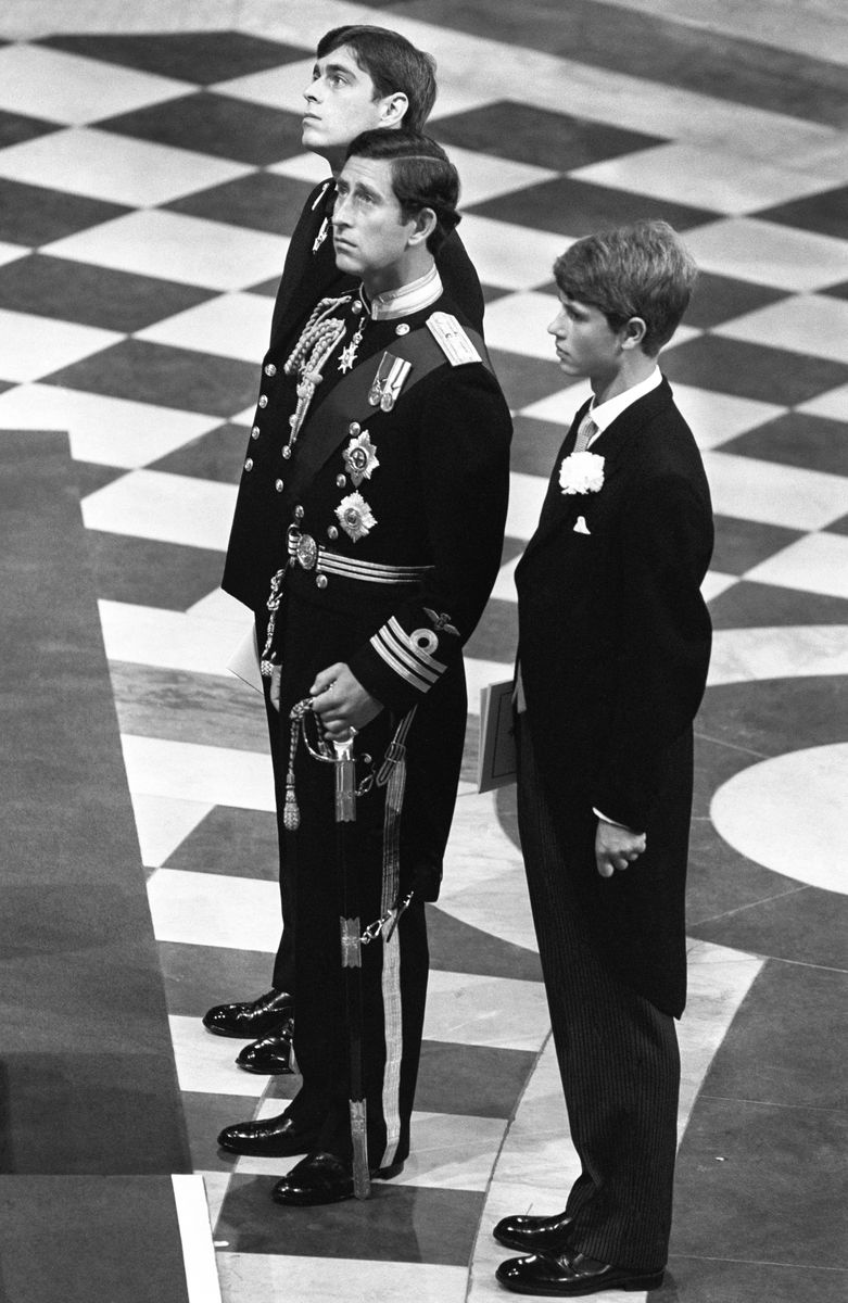 <p>Prince Charles patiently waits for Diana to arrive while flanked by his two groomsmen, brothers Prince Andrew and Prince Edward. </p>