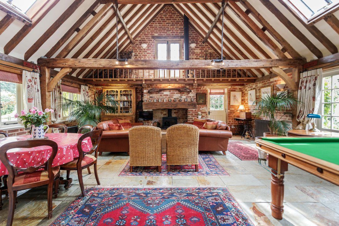 <p>A traditional barn in the woodlands of the Surrey Hills near the market town of Dorking, where only walkers and horse riders make up the traffic, this is a fabulous home from home outside of London. </p><p>A pool table for entertainment, three bedrooms and beautiful features, like the exposed beams and picturesque garden, make this one place you'll love for a weekend getaway with friends or family.</p><p><a class="body-btn-link" href="https://airbnb.pvxt.net/DVWx6y">CHECK AVAILABILITY</a></p>