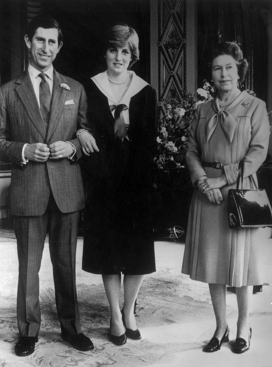 <p>Prince Charles and Diana pose with Queen Elizabeth II at Buckingham Palace after she gave her consent for their wedding. Is it just me or does everyone look rather...tense?</p>
