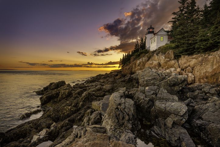 Slide 5 of 29: Most national parks boast panoramic views that must be seen in person to be believed, and Acadia delivers on that score. At sunset, Acadia's Bass Harbor Head Lighthouse doesn't particularly need a great photographer to get a decent photo. Still, this photographer took a genuinely great one.