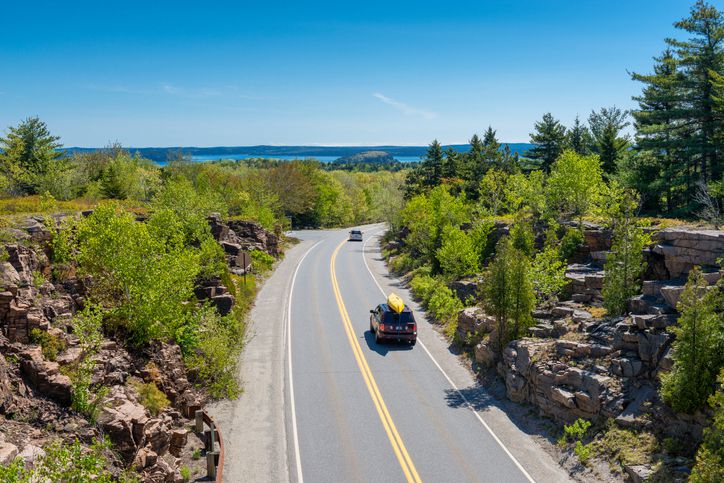 Slide 26 of 29: You don't have to hike to enjoy Acadia National Park’s attractions. A lot of it is accessible is by car. It’s full of paved roads to give your shock absorbers a break, and what better way is there to bring your canoe than by strapping it to the top of your car?