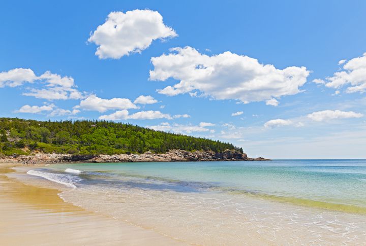 Slide 21 of 29: If you want a more traditional beach experience — like one with sand — tell your kids (or your inner kid!) to get their pail and shovel. Acadia National Park has sandy beaches that offer the opportunity to build and destroy as many sandcastles as you want.