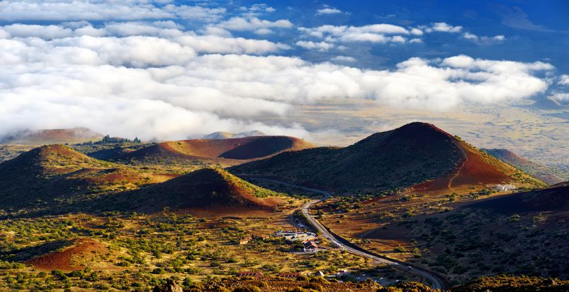 <p>Translating to Long Mountain, Mauna Loa is 74 miles tall from the southern tip to the northeast coastline. It's considered the largest volcano on earth, and it is among the most active volcanoes with 33 eruptions. </p>