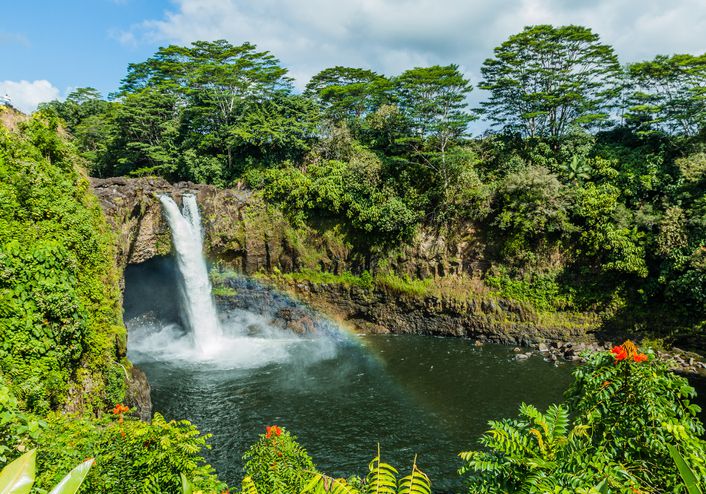 <p>Located in Wailuku River State Park is an 80-foot waterfall nicknamed Rainbow Falls. Reliably, on most sunny mornings around 10 a.m., you can spot rainbows in the waterfall mist.</p>