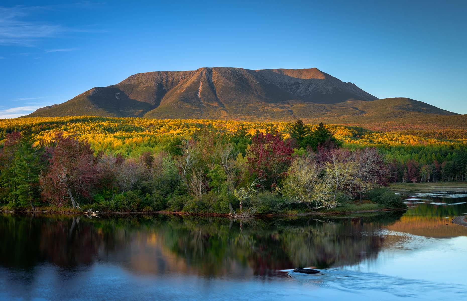 <p>With miles of stunning natural landscape, the drive along <a href="https://www.katahdinwoodsandwaters.com/">this scenic byway</a> is dominated by Katahdin (pictured) – Maine's tallest mountain. Starting at Baxter State Park and following Route 11 and the Penobscot River, the 89-mile (143km) route has several stops along the way, including Ash Hill which provides an incredible view of Katahdin, and the surrounding mountains and forests. Visitors can make the most of the outdoors by canoeing the remote East Branch of the river with its seven waterfalls or whitewater rafting in the West Branch.</p>