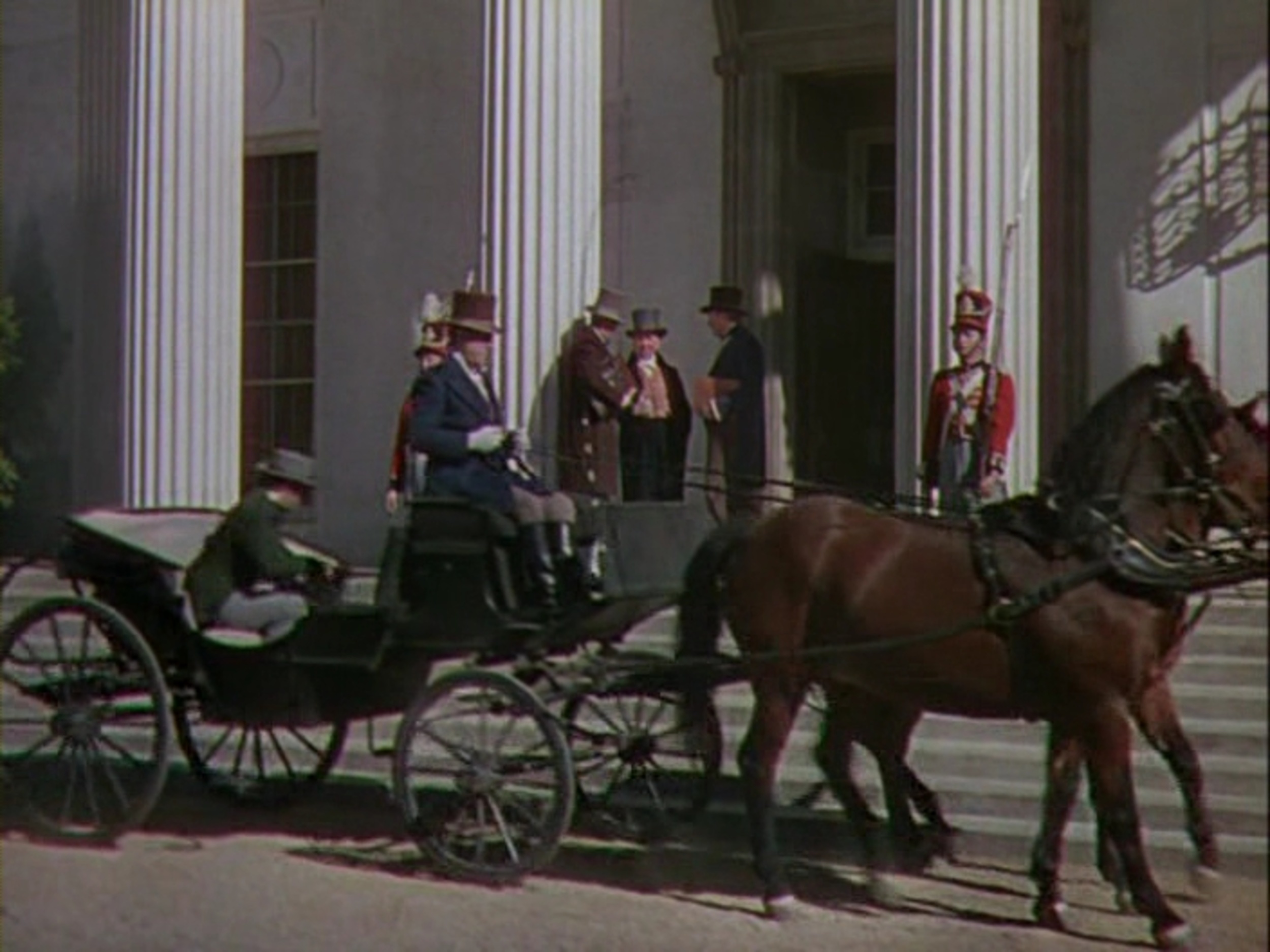 <p>Did you know Hitch did a movie set in Australia? Honestly, we didn’t either until we were putting this all together. This is a period piece, and you can definitely see the director on the steps of the Government House with two other gentlemen.</p>