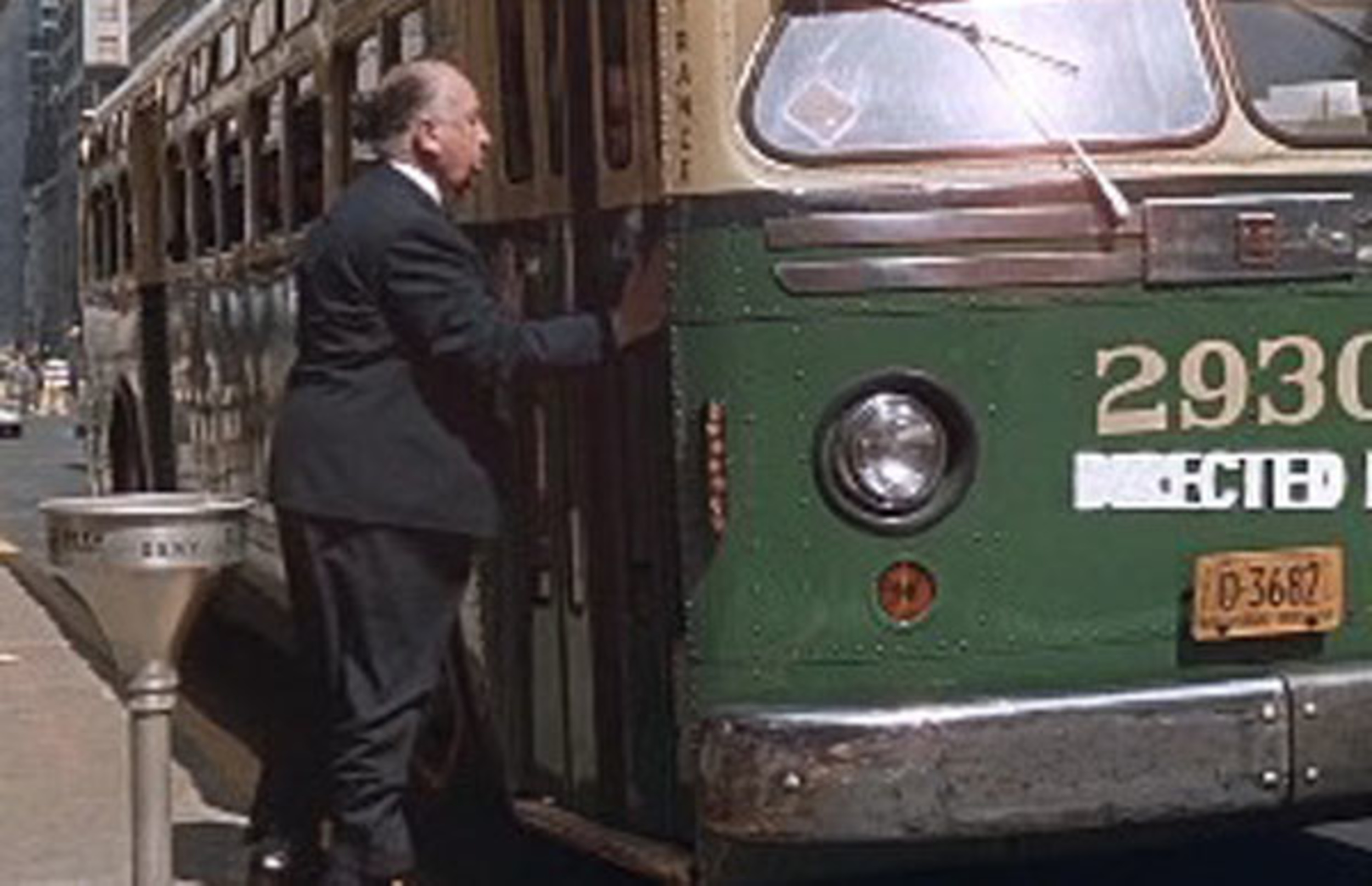<p>Hitch doesn’t have much luck with public transit. Right at the end of the opening credits, Hitchcock fails to get on board a New York City bus. It closes its doors in his face and he’s left to wait for the next bus, we assume. Better luck next time, Hitch!</p>