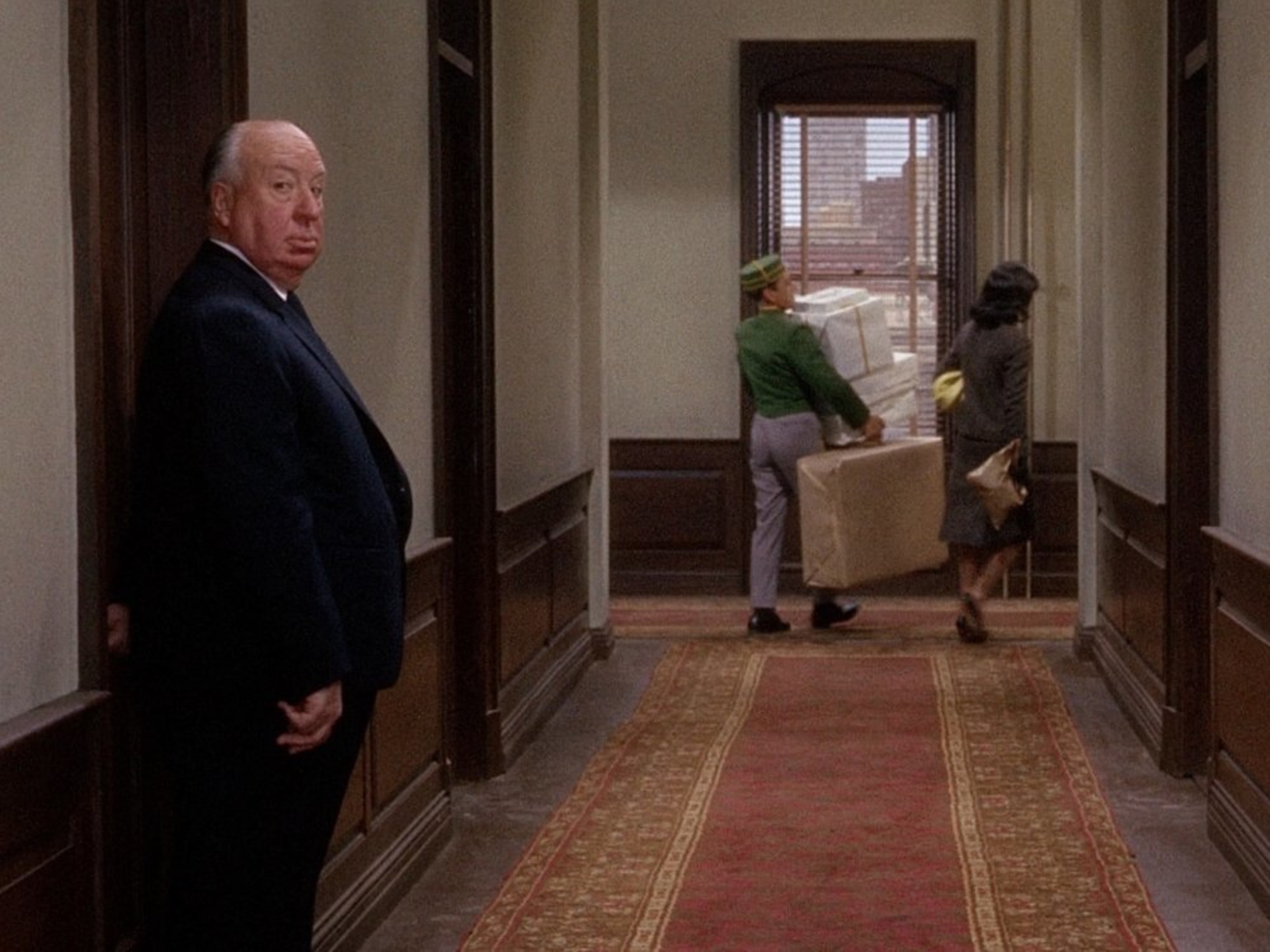 <p>OK, so Hitchcock was feeling himself here. The cameo officially went meta. In a hotel, the director enters from the left of the screen and then straight-up looks at the camera like he’s Jim Halpert. It’s a bit much, but the guy was a legend by this point. Who was going to stop him?</p>