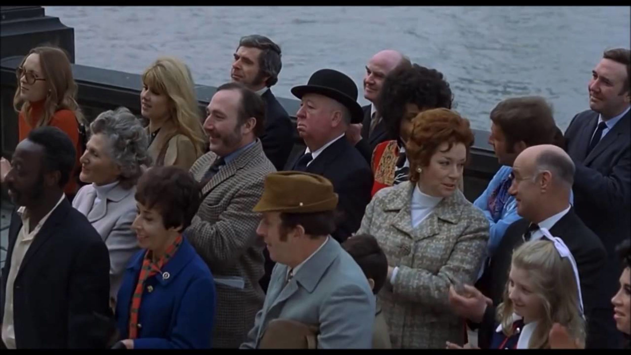 <p>By the ‘70s, Hitchcock’s best days were behind him. You can see him in “Frenzy,” a weird little film, as a man in a crowd wearing a black suit and a bowler hat. He looks a bit like a man out of time. He’s also the only one who doesn’t applaud during the speech being given.</p>