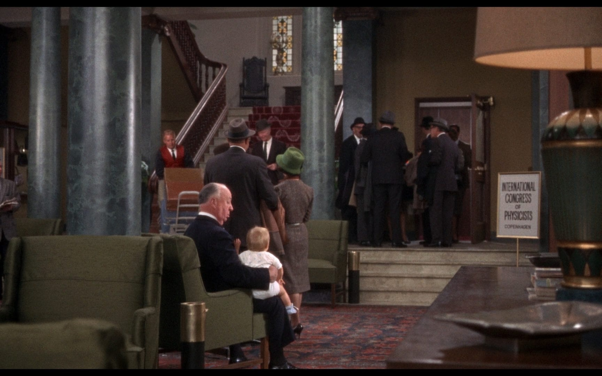 <p>Speaking of calling attention to himself, Hitchcock is seen in a hotel in Copenhagen in “Torn Curtain” with a baby on his lap. During the time he is on screen the music changes. What does the music change to? Why, “Funeral March of the Marionette” of course. That’s also known as the theme song to “Alfred Hitchcock Presents.”</p>