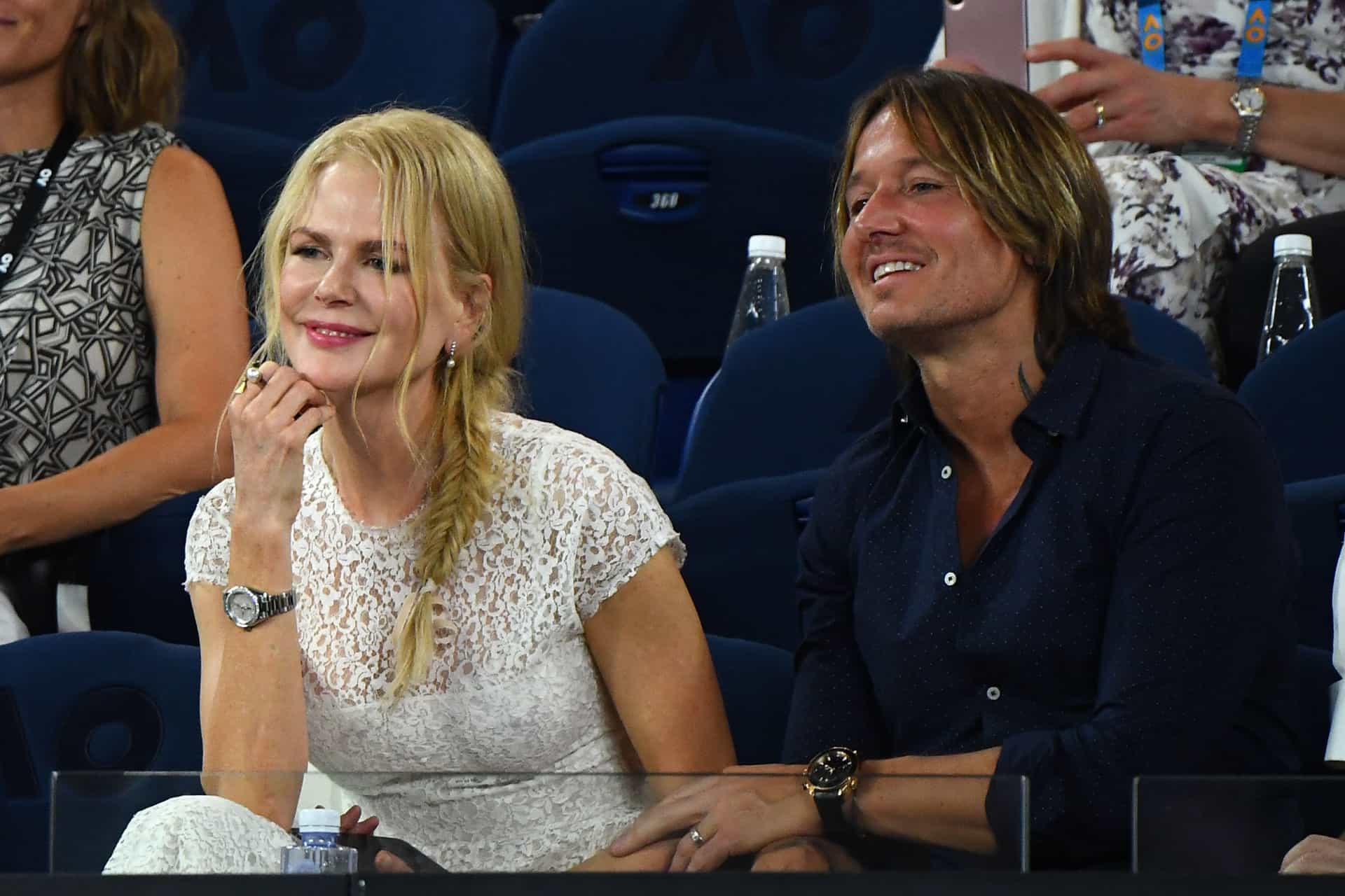 Keith Urban et al. sitting posing for the camera