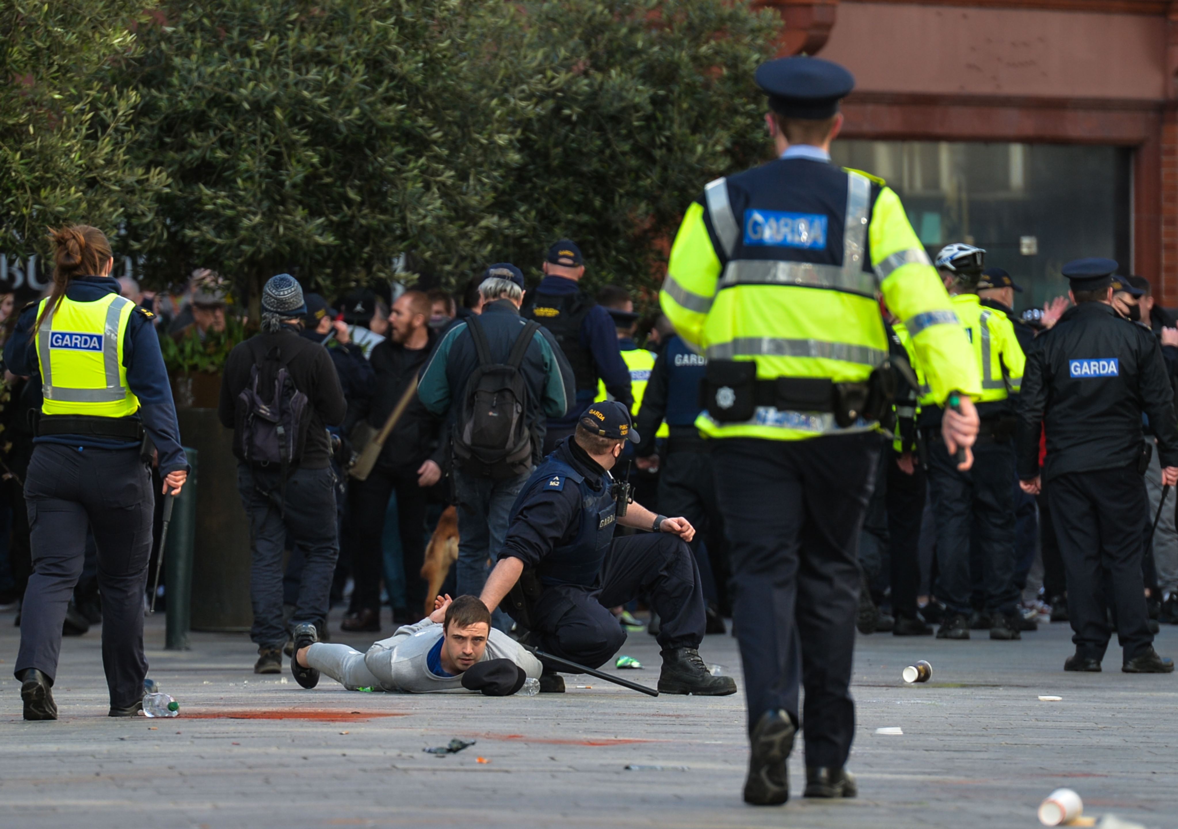 A group of Anti-Lockdown protesters clash with Gardai (Irish Police) in Grafton Street, Dublin, during Level 5 Covid-19 lockdown. On Saturday, Fabruary 27, 2021, in Dublin, Ireland.