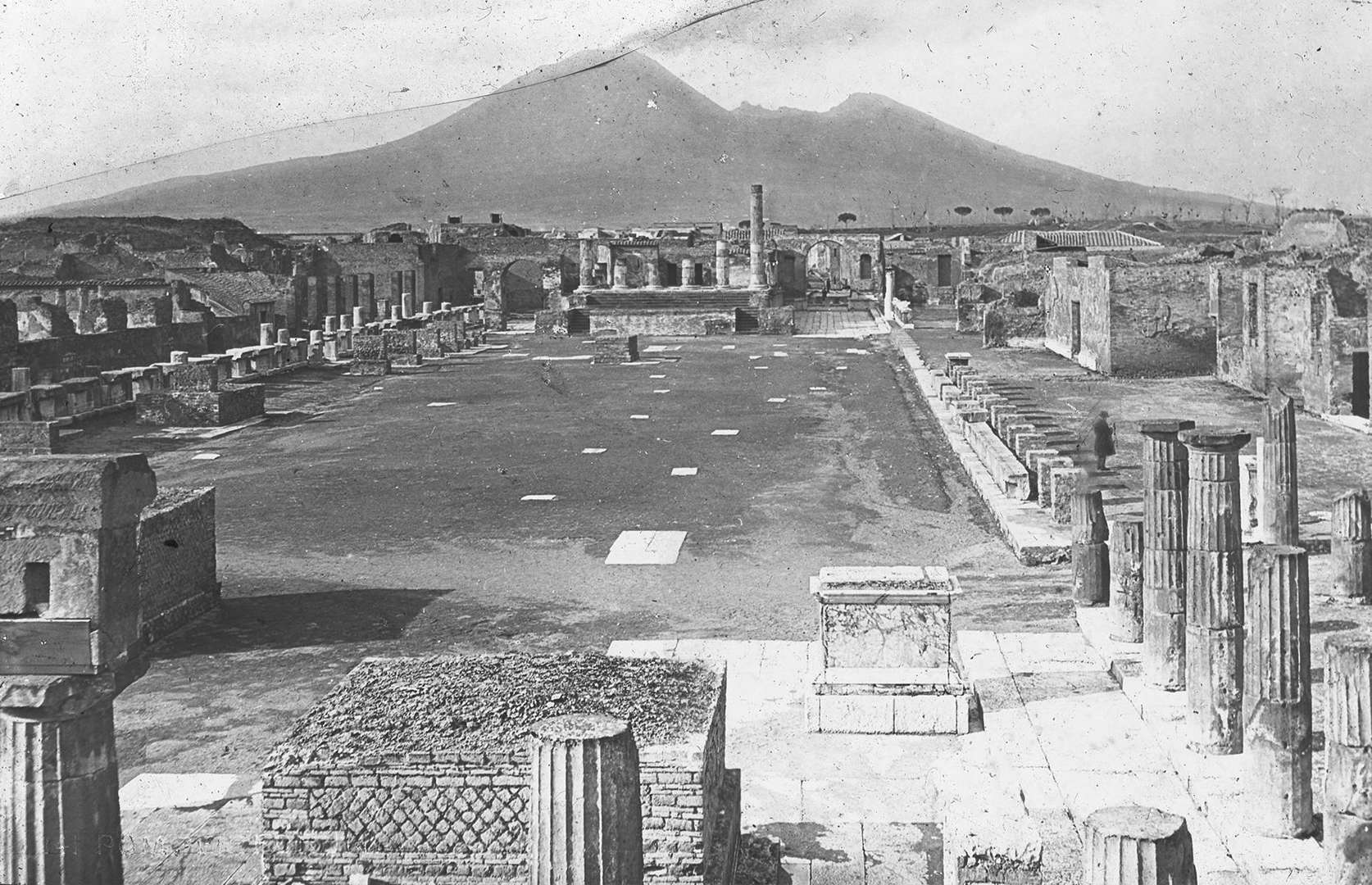 Slide 32 of 41: Probably the world's most famous ruined city, Pompeii was swallowed by lava and ash when Mount Vesuvius erupted in AD 79. Before it met its tragic fate, the city was a booming centre of trade and a cultural hub, with buildings such as bathhouses, temples, an amphitheatre and more. When Pompeii's ruins were finally uncovered in the 16th century, they were impressively preserved due to the layer of ash that had shrouded them for millennia. They're shown here in the early 20th century.