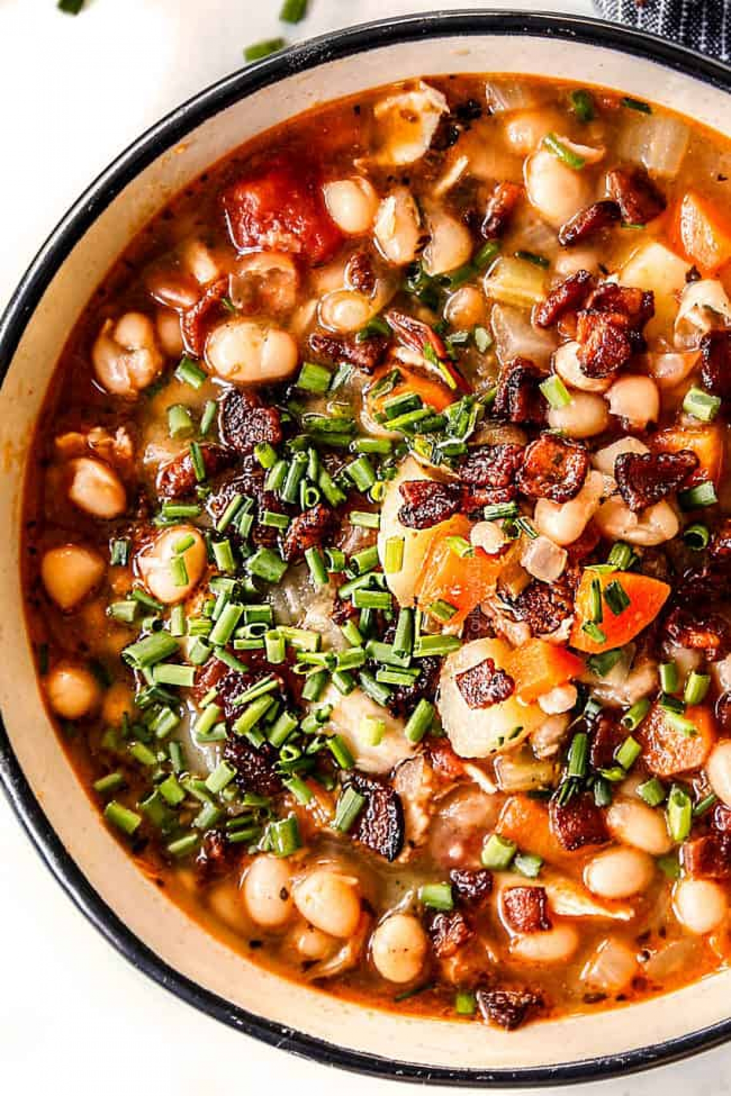 <p>For chillier evenings, this navy bean soup is the perfect cozy meal to tuck into, to warm you from the inside out. With tons of veggies, smoky bacon and your choice of ham or chicken, it's wonderfully versatile and totally satisfying. <a href="https://carlsbadcravings.com/navy-bean-soup/" rel="noopener">Get the recipe here.</a></p>