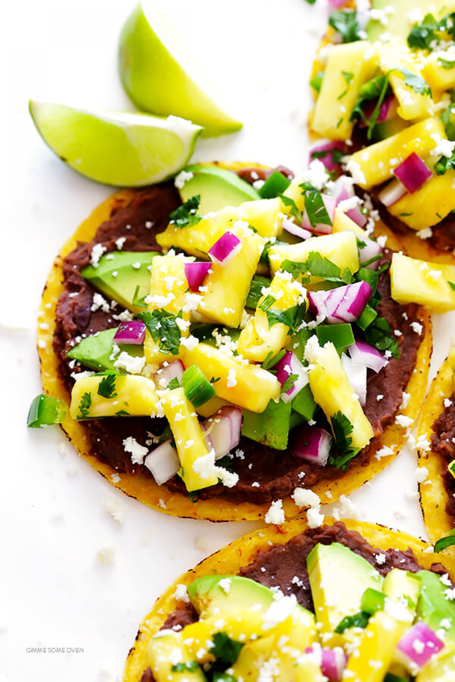 <p>Got a bunch of hungry mouths to feed and not a lot of time on your hands? These 10-minute vegetarian tostadas will delight the whole family with a combination of savory refried black beans and refreshing pineapple salsa you can whip up in no time. <a href="https://www.gimmesomeoven.com/10-minute-pineapple-black-bean-tostadas/" rel="noopener">Get the recipe here.</a></p>
