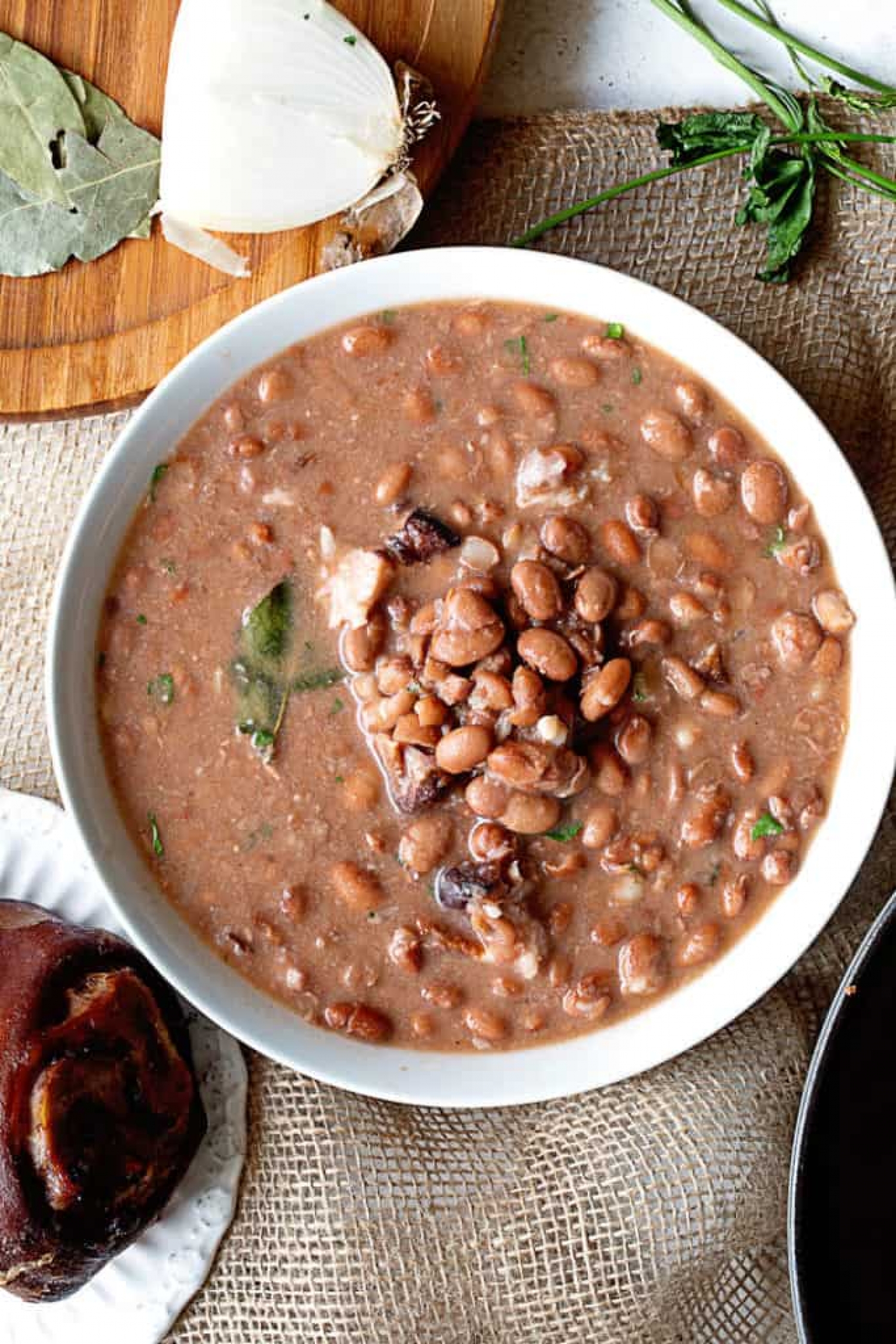 <p>Get your Southern comfort on, with <a href="https://grandbaby-cakes.com/pinto-beans/" rel="noopener">this hearty recipe</a> for pinto beans, simmered up with budget-friendly ham hocks and a few simple seasonings. Make sure you soak the pinto beans overnight so they're plumped and ready to cook!</p>