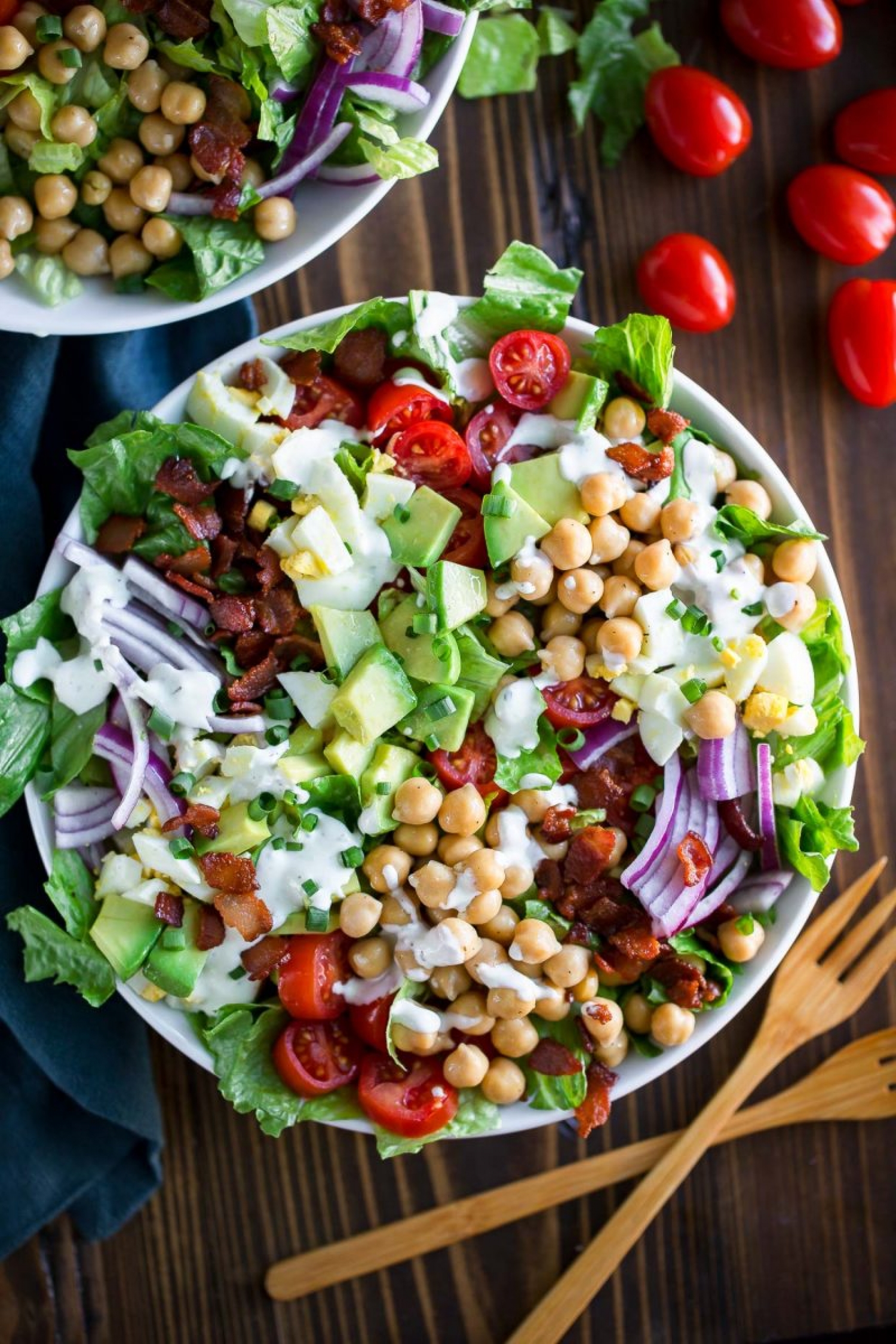 <p>Put a vegetarian spin on everybody's favorite classic American salad by swapping out the chicken for chickpeas! Don't forget to sub in veggie bacon, too. It's healthier, and with all the other goodness in there, no one will miss the meat. <a href="https://peasandcrayons.com/2020/01/chickpea-cobb-salad.html" rel="noopener">Get the recipe here.</a></p>
