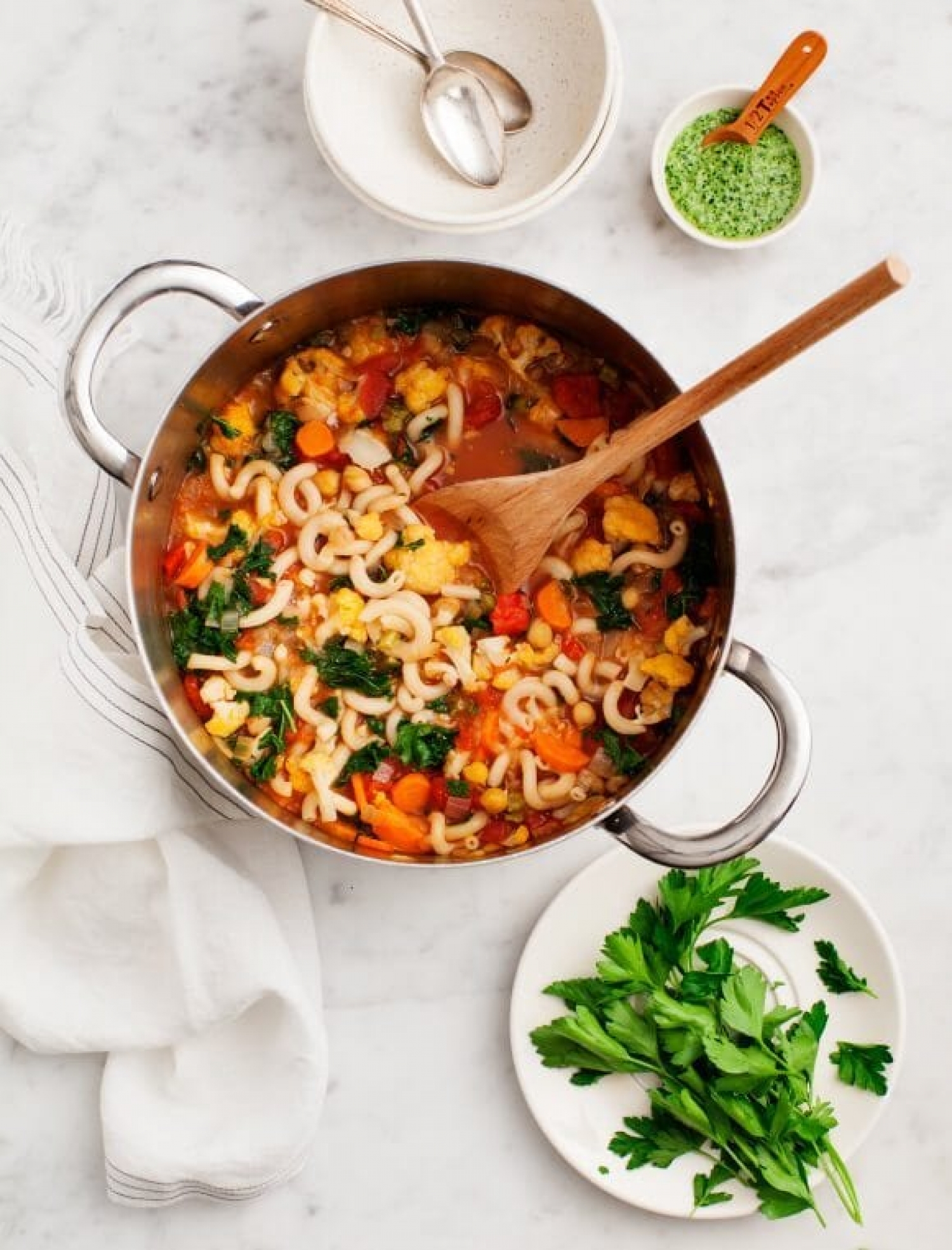 <p>Chickpeas (aka garbanzo beans), cauliflower and other veggies make up this beautiful vegetable stew that's light enough for spring meals. Serve with generous shavings of Parmesan cheese for a tangy finish. <a href="https://www.loveandlemons.com/chickpea-cauliflower-minestrone-soup/" rel="noopener">Get the recipe here.</a></p>