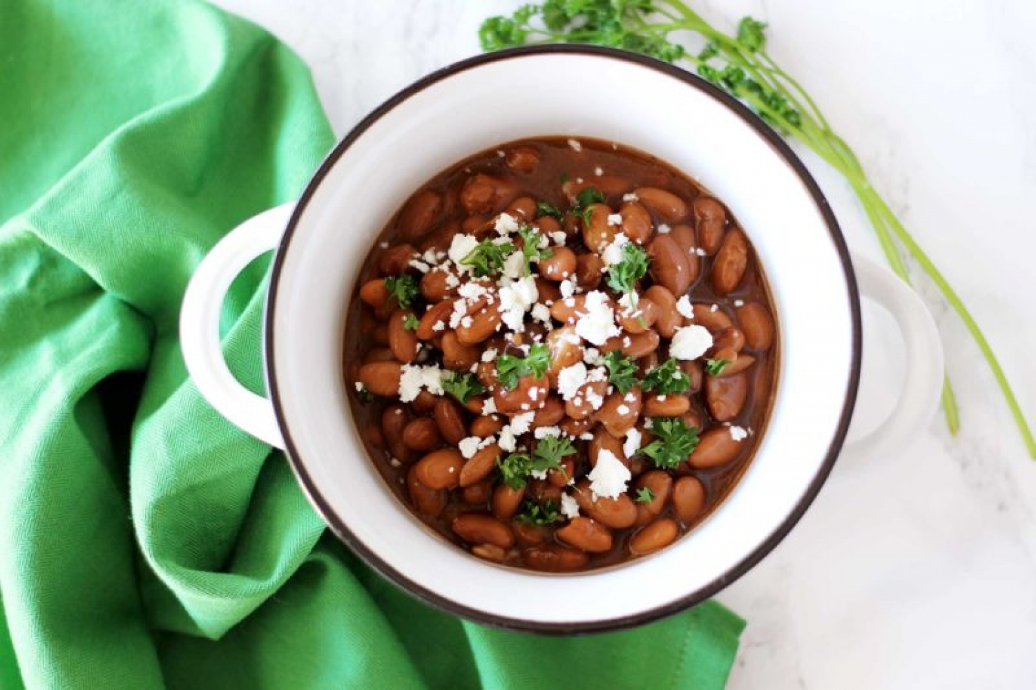 <p>When you want to make pinto beans from scratch, turn to <a href="https://recipesworthrepeating.com/slow-cooker-pinto-beans/" rel="noopener">this super easy slow cooker recipe</a> that only requires 4 extra ingredients. Get it going in the morning before you head out the door, and come home to perfectly cooked beans ready to serve with any dish.</p>